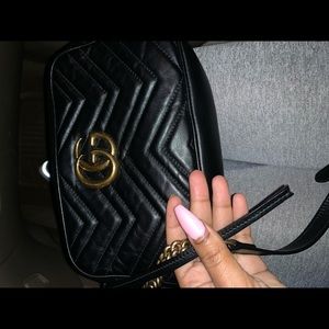 Women’s black Gucci crossbody bag